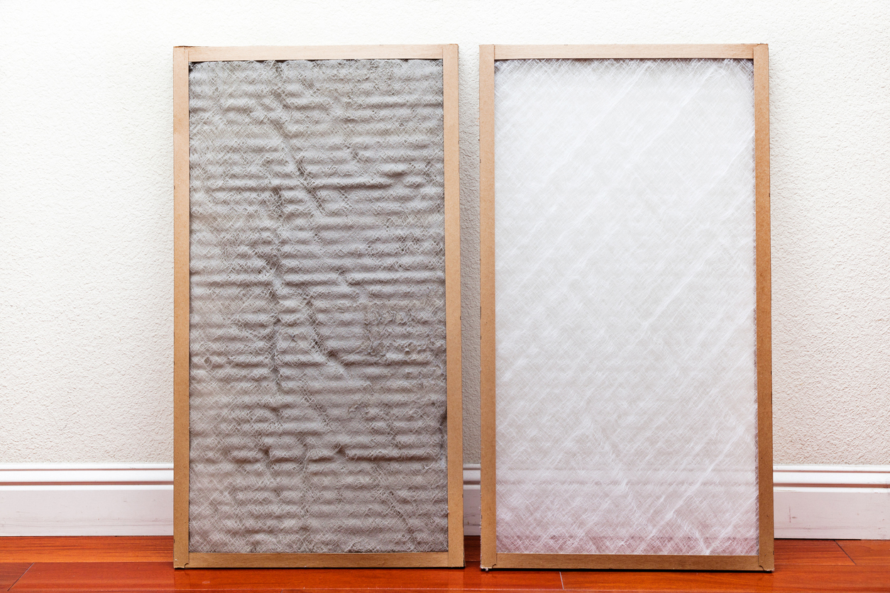 Side-by-side image of dirty air filter next to clean air filter