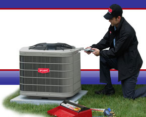 Image Of Worker Doing Air Conditioner Repair Novi, MI -  D & G Heating & Cooling, Inc.